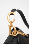Close-up of 'CD' logo hardware