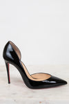 Black high-heeled shoe with a red sole on a light background