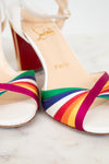 Rainbow detail with a brand name on a light background