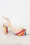 White sandal with a rainbow strap and gold chunky heel on a white background