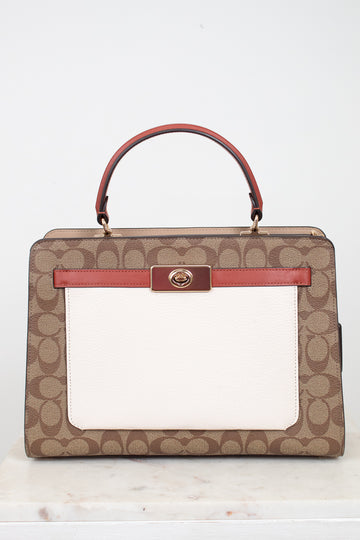 Handbag with brown and red design on a white background