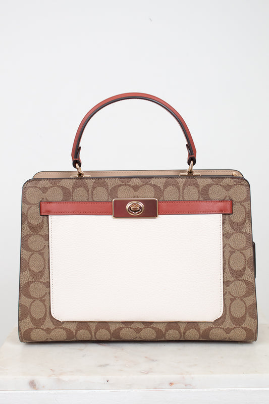 Handbag with brown and red design on a white background
