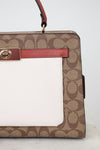 Handbag with brown and white pattern on a light background