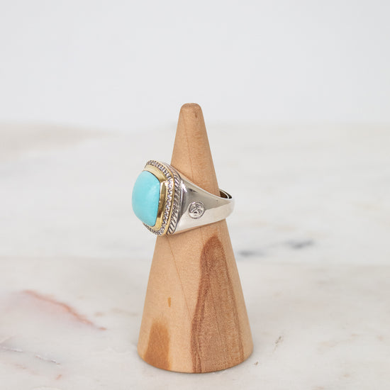 Turquoise squared center stone with gold and diamond border with side stamp detail