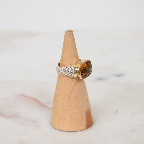 Side view of citrine stone and visible silver and gold hardware