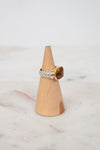 Side view of citrine stone and visible silver and gold hardware