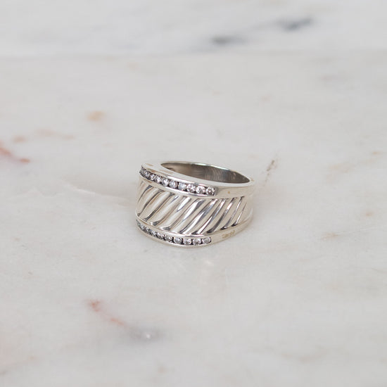 Silver cable band ring with diamond border details