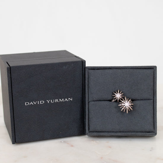 David Yurman earrings in a black box on a marble surface