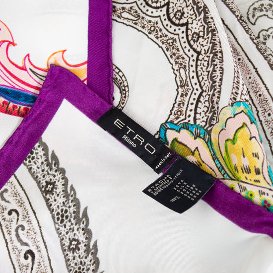 Close-up of a patterned fabric with a visible Etro label.