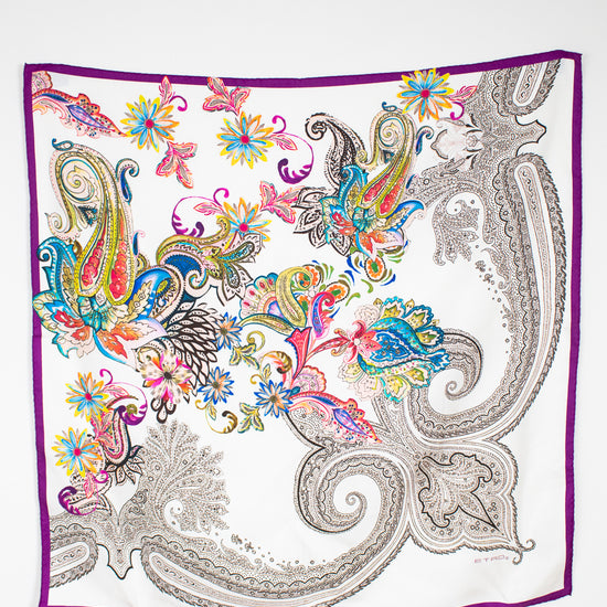 Colorful paisley patterned scarf on a white background
