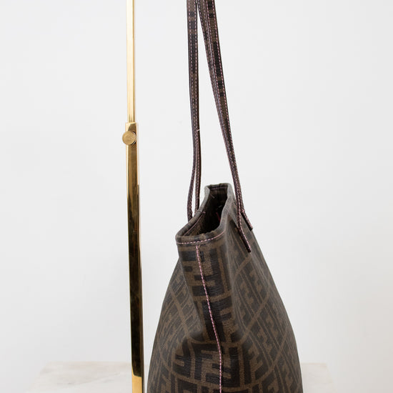 Fendi handbag with a prominent FF logo on a white background