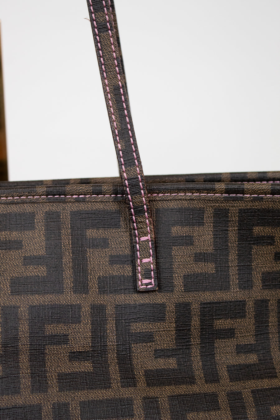 Fendi handbag with a prominent FF logo on a white background