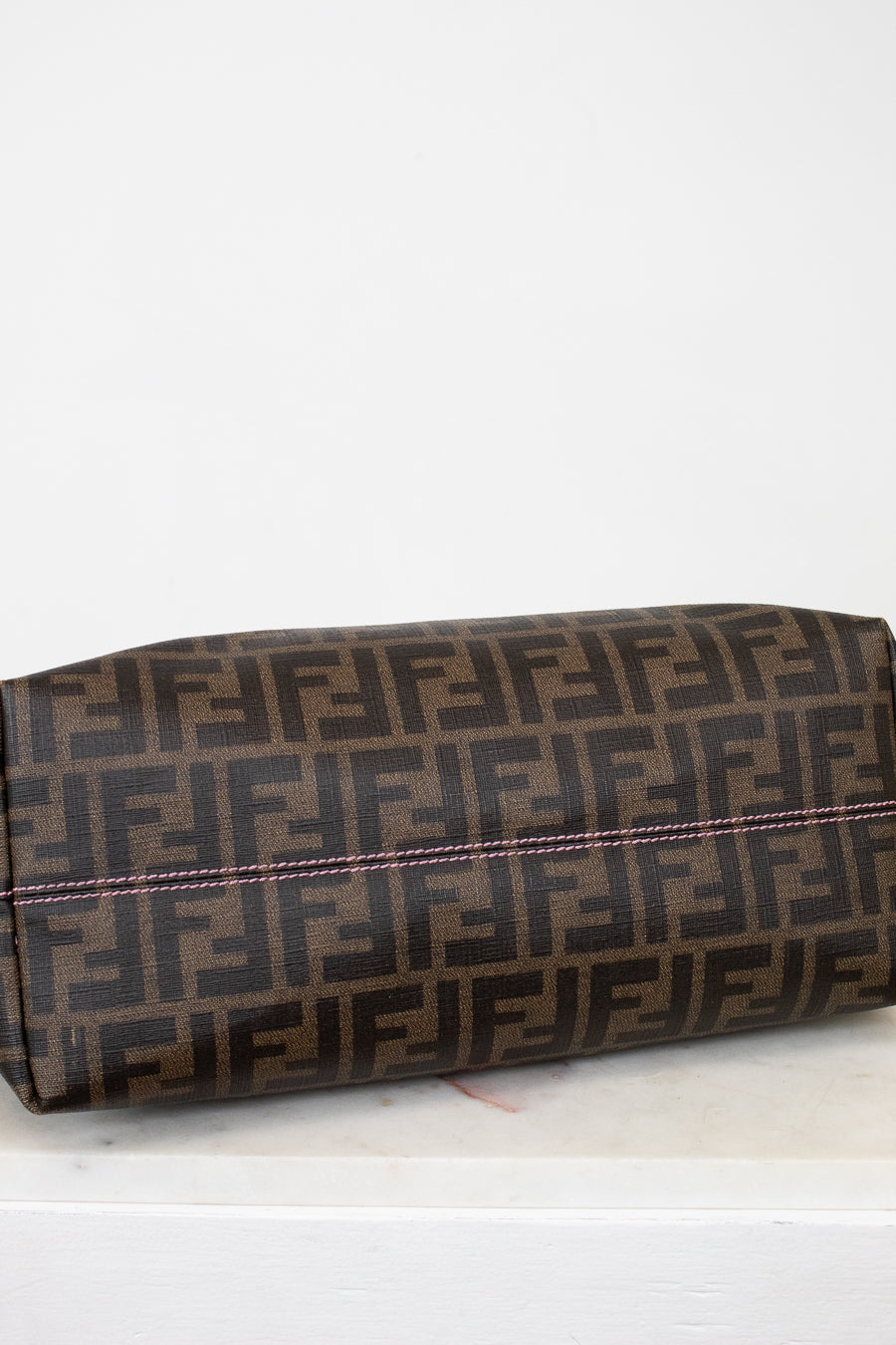 Fendi handbag with a prominent FF logo on a white background