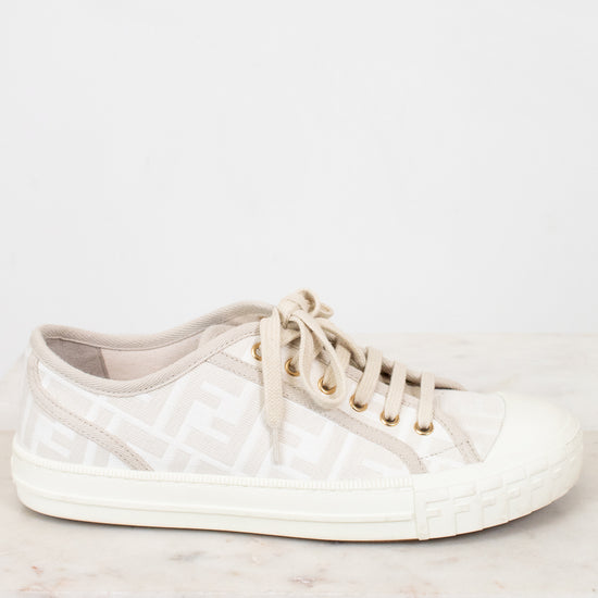 White sneaker on a light gray surface