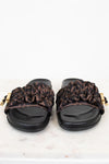 Pair of sandals with Zucca print straps on a white background