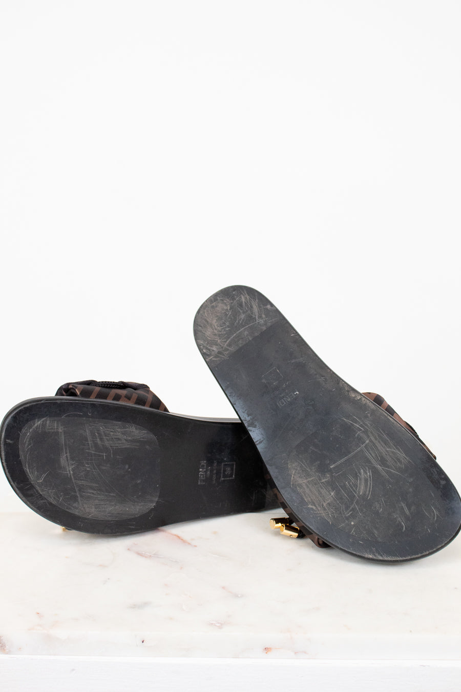 Bottom black sandal sole on a white background