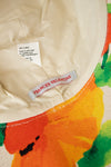 Cream hat interior with colorful edge and "Frances Valentine" tag