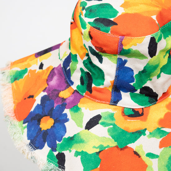 Colorful floral-patterned bucket hat on a white background