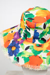 Colorful floral-patterned bucket hat on a white background