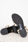 Black sandal sole with brand name on a white background