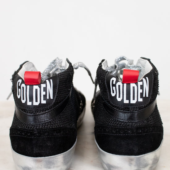 Black high-top sneakers with 'GOLDEN' branding on a white background