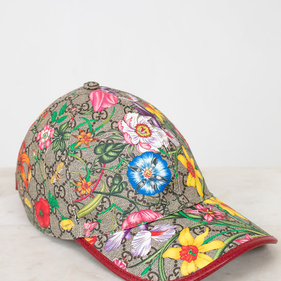 Colorful floral-patterned baseball cap on a white background