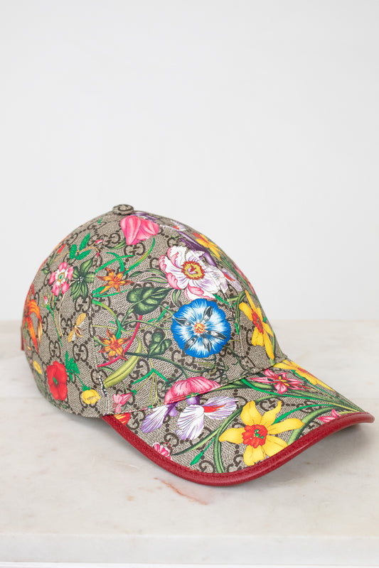 Colorful floral-patterned baseball cap on a white background