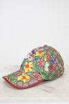 Floral-patterned cap on a white background