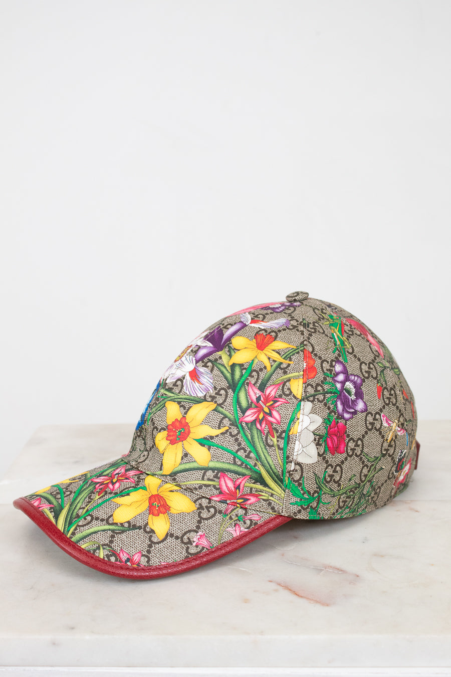 Floral-patterned cap on a white background