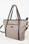 Designer handbag with a distinctive pattern on a white background