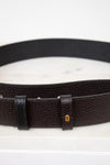 Black leather belt with a buckle on a white background