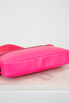 Pink bag base view on a white surface