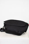 Black Gucci bag on a white background