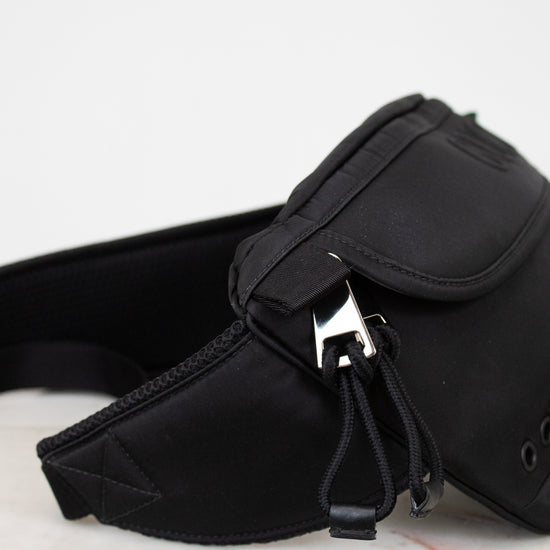 Black waist bag on a white background