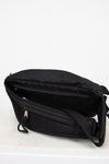 Black waist bag on a white background