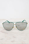 Front view of teal aviator sunglasses with gray lenses