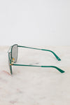 Side view of teal frames with gold-tone accents