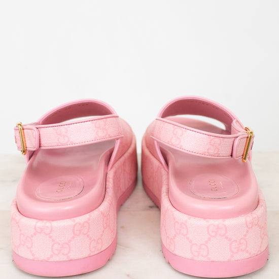 Back heel view of pink platform sandals