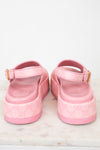 Back heel view of pink platform sandals