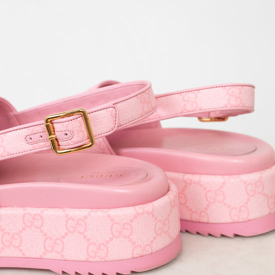 Heel view of pink monogram sling-back platform sandal