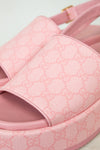 Close-up view of pink monogram sandal