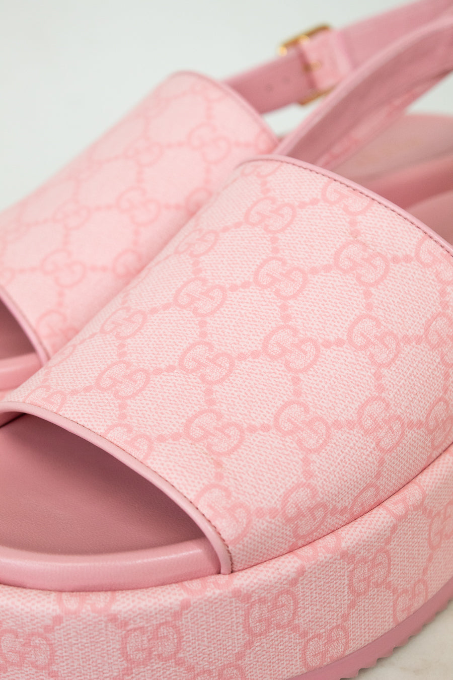 Close-up view of pink monogram sandal