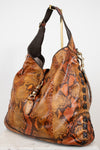 Brown snakeskin pattern handbag with black strap on a white background