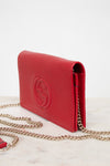 Red handbag with gold chain on a white background