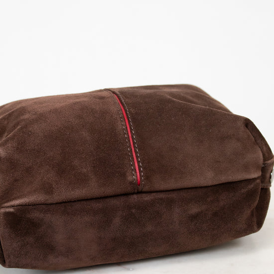 Brown suede to hobo bag with red stitching on a white background
