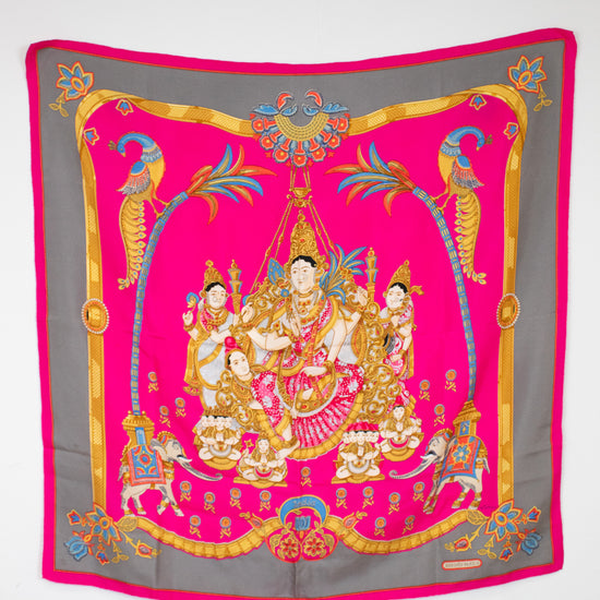 Decorative scarf with intricate design on a white background