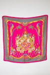 Decorative scarf with intricate design on a white background