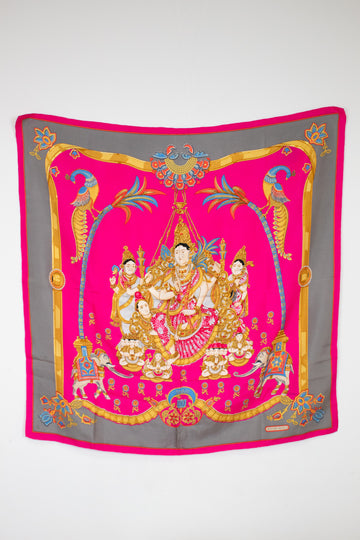 Decorative scarf with intricate design on a white background
