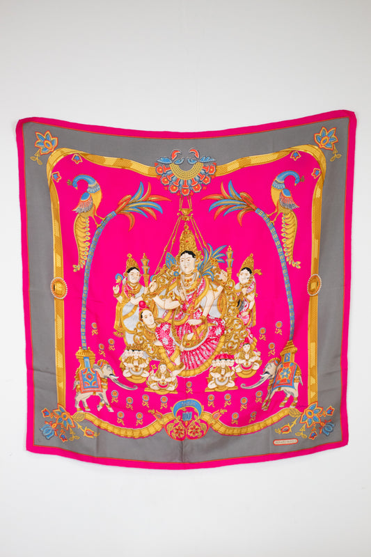 Decorative scarf with intricate design on a white background