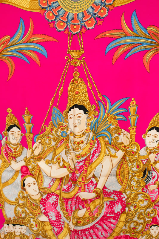 Decorative design scarf with a central figure in ornate attire on a pink background